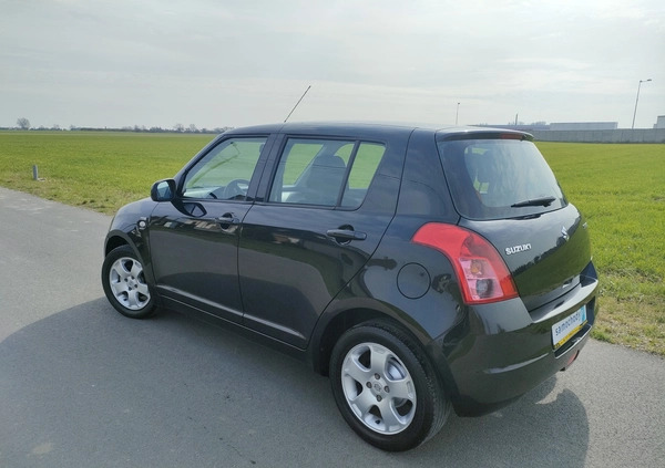 Suzuki Swift cena 13900 przebieg: 170675, rok produkcji 2009 z Zambrów małe 407